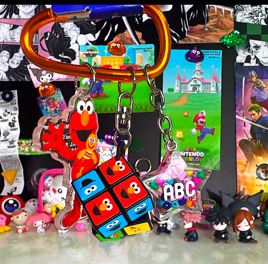 Sesame Street Elmo and mini Rubik's Cube puzzle keychain
