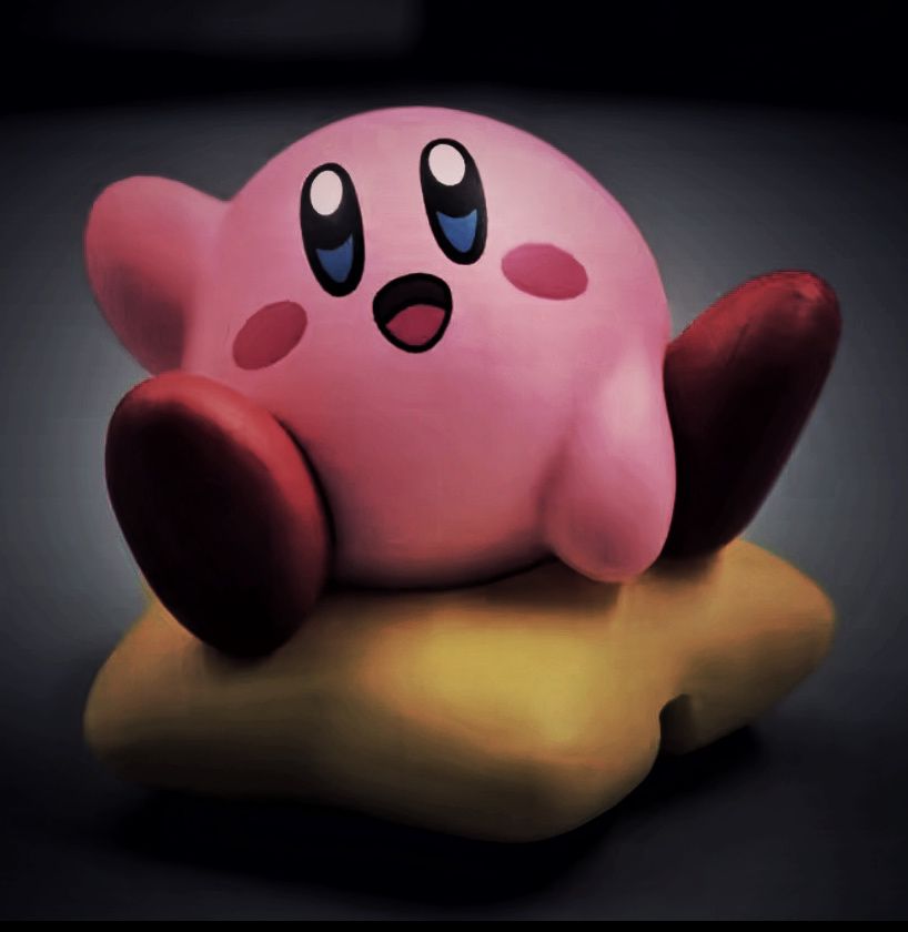 Small Kawaii Kirby sitting on star figure